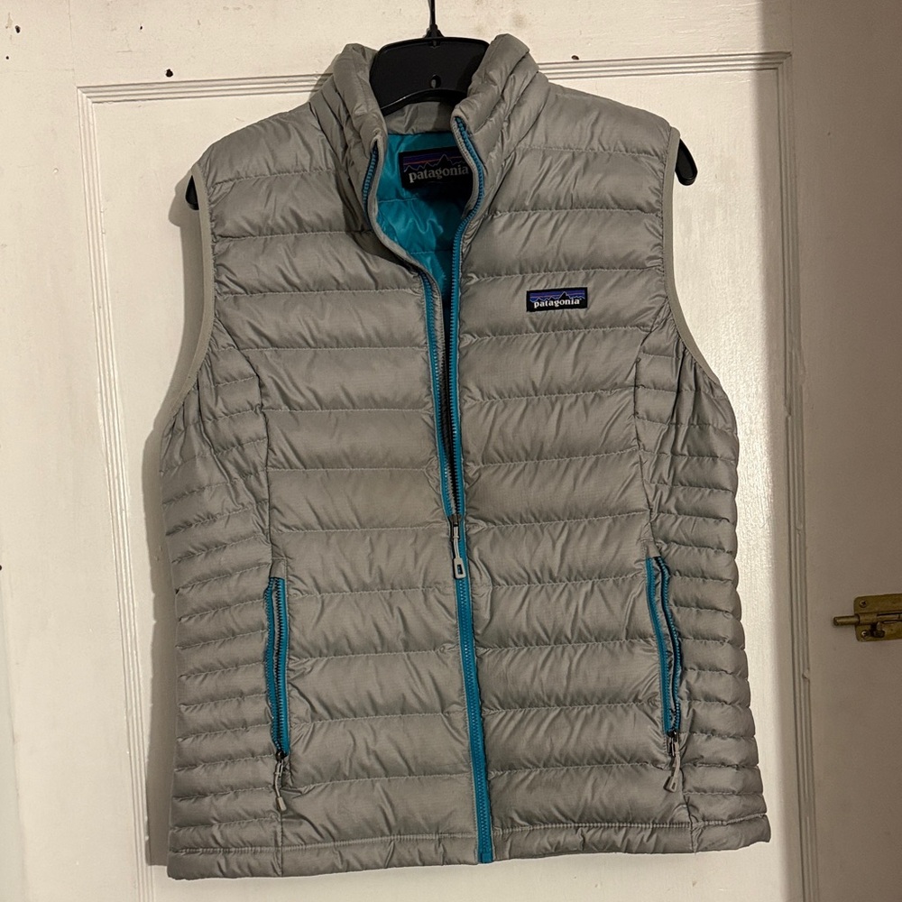 Patagonia Light Gray Puffer Vest with Teal Accents